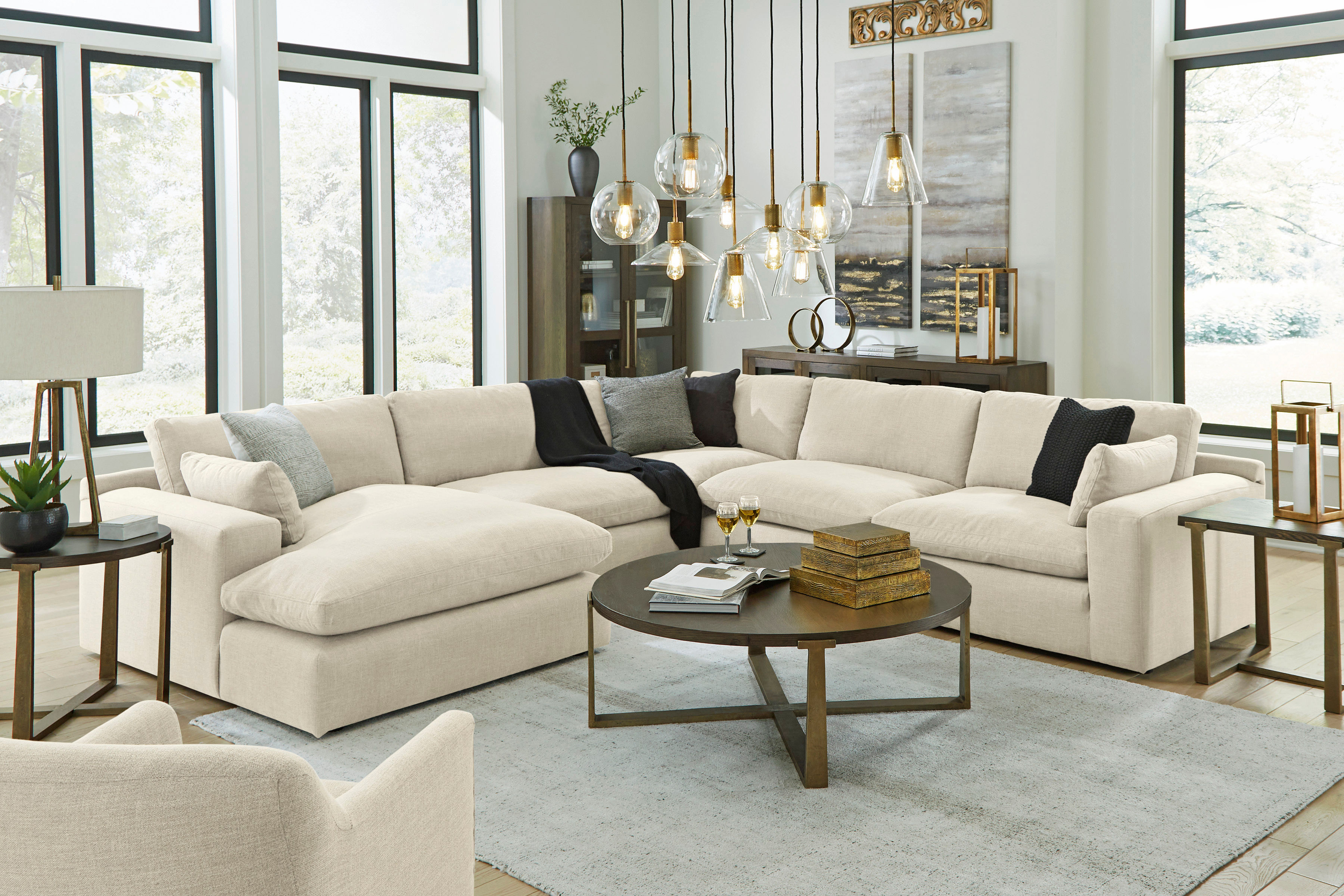 Living room with sofa, dining set, and bedroom set